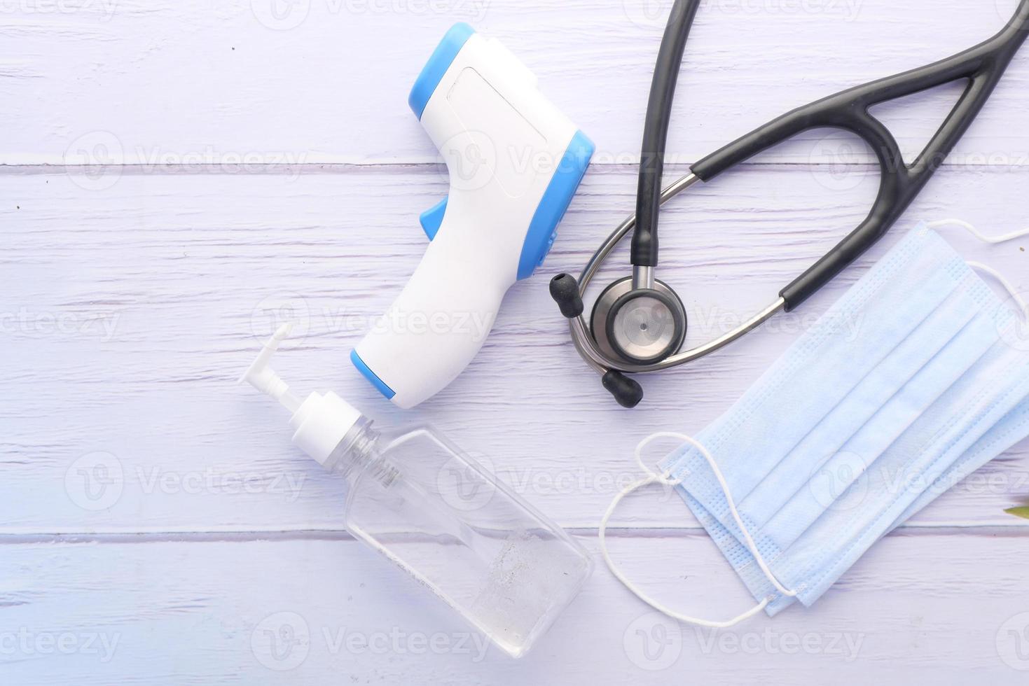 Medical supplies on white wood background photo