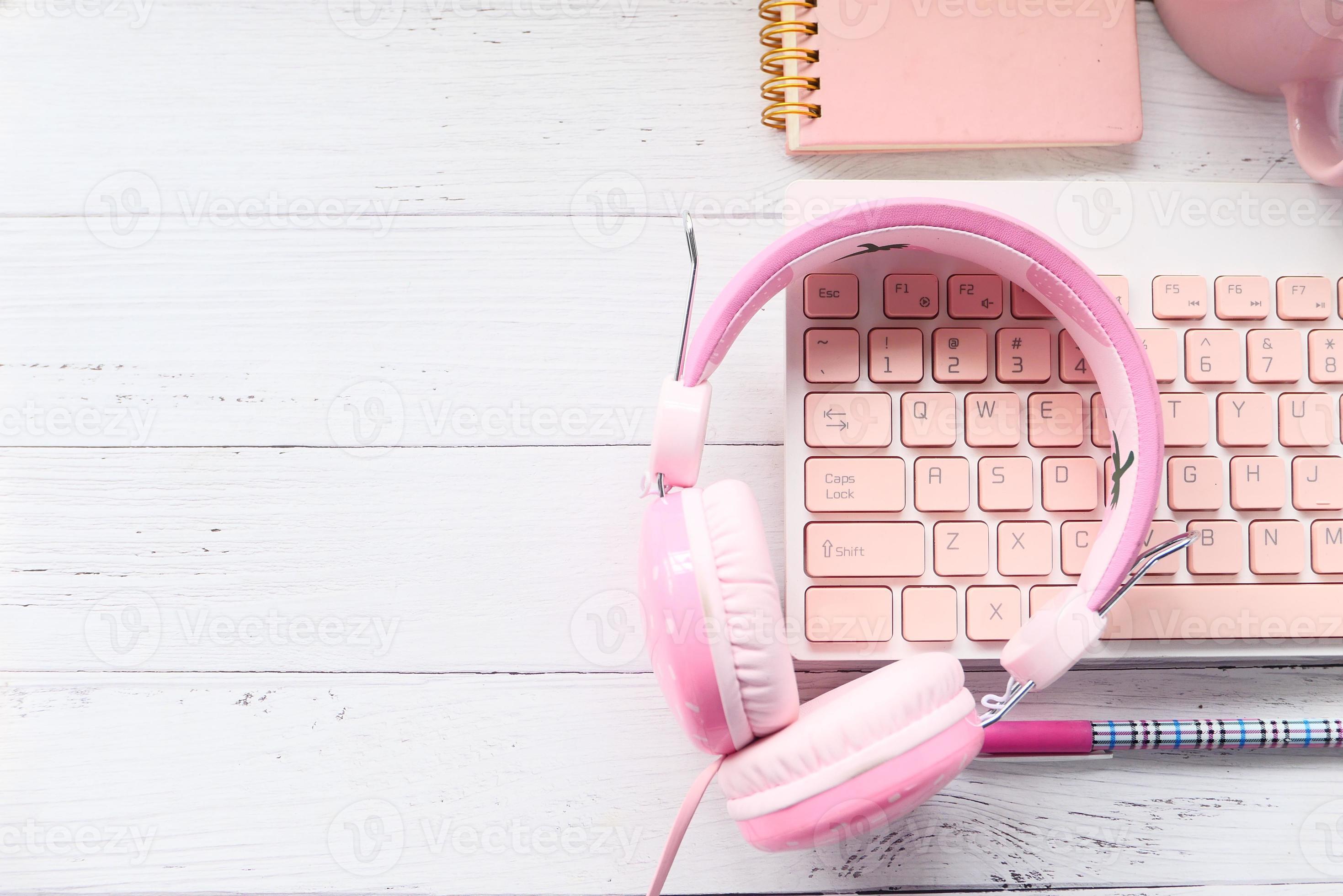 Pink headphones and keyboard 2073556 Stock Photo at Vecteezy