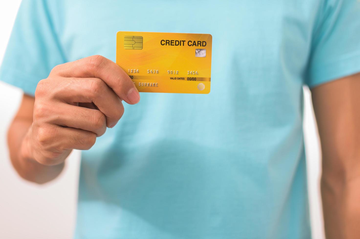 A man holding a credit card photo