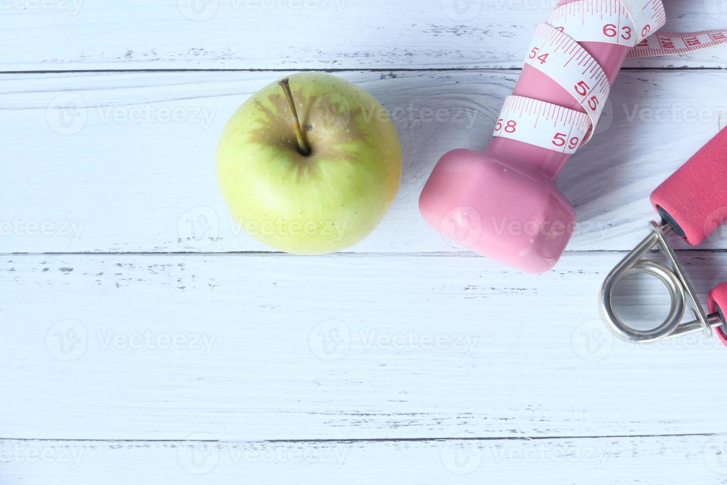 concepto de fitness con una manzana foto