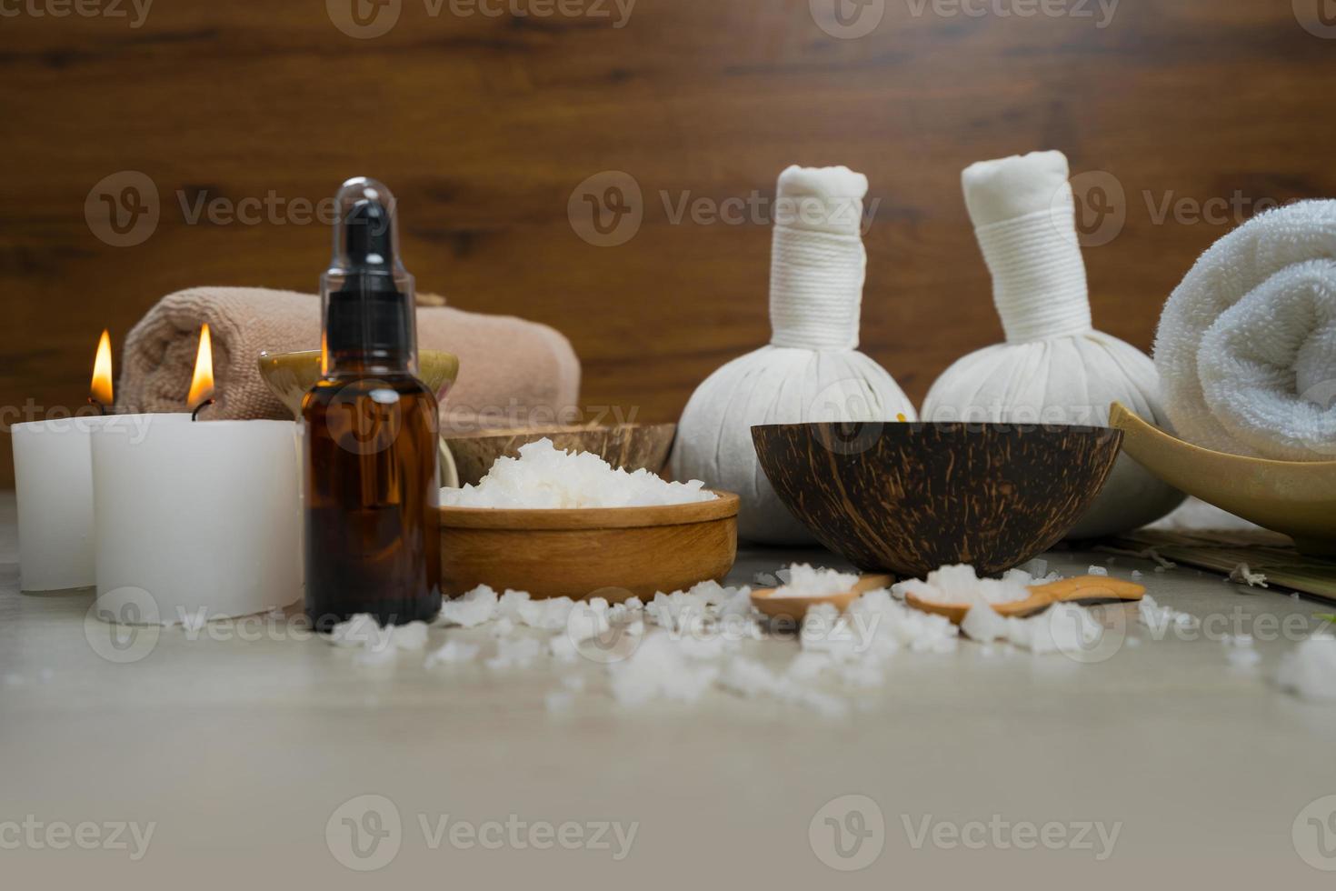 Composition of spa treatment on wooden table photo