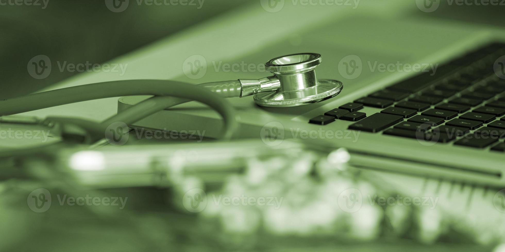 Stethoscope and medicine close-up photo