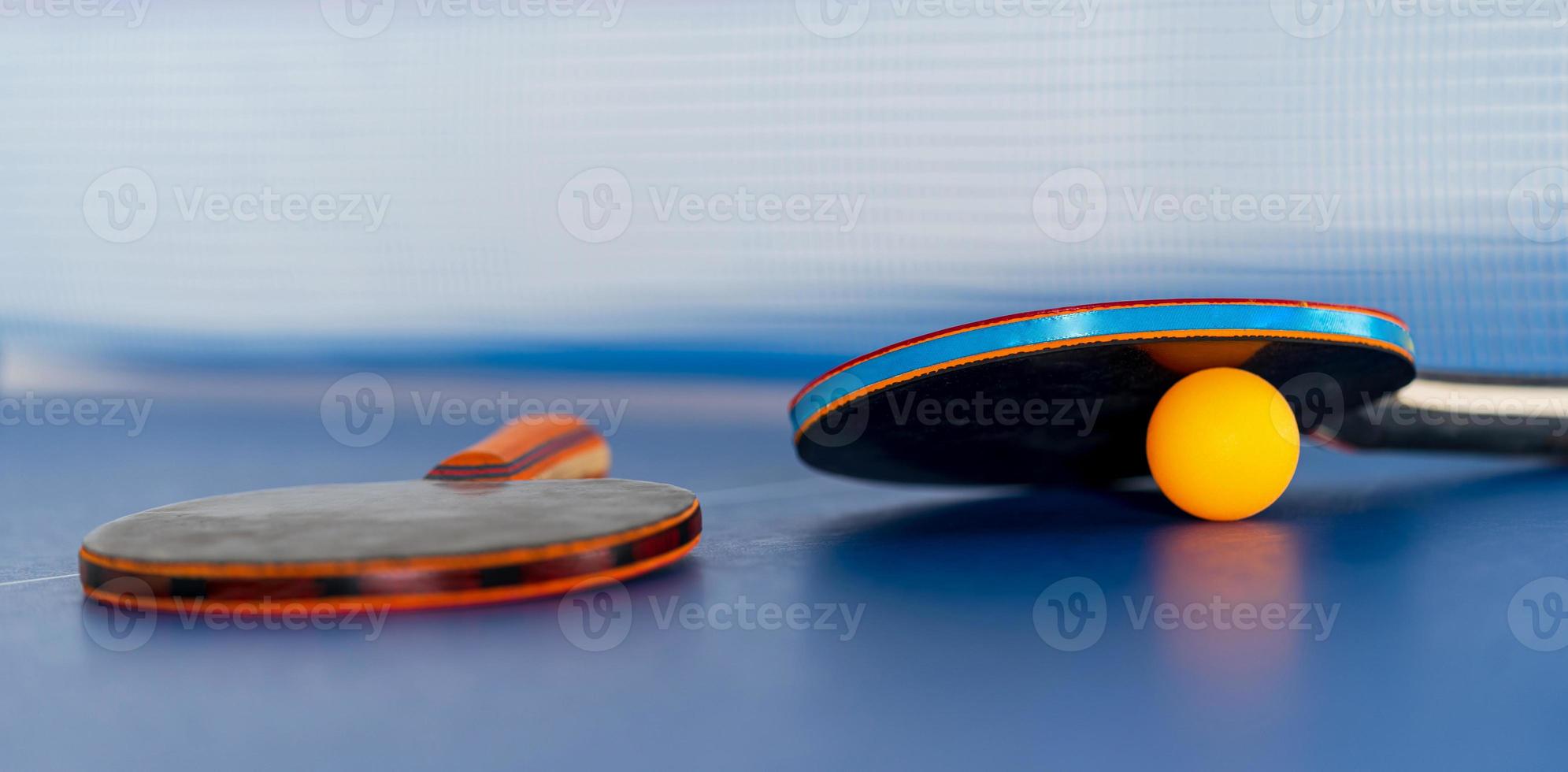 Table tennis racket and ball photo