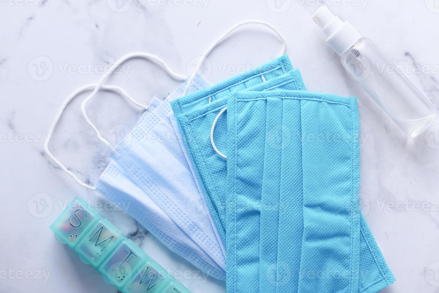 Close up of blue surgical masks on table photo