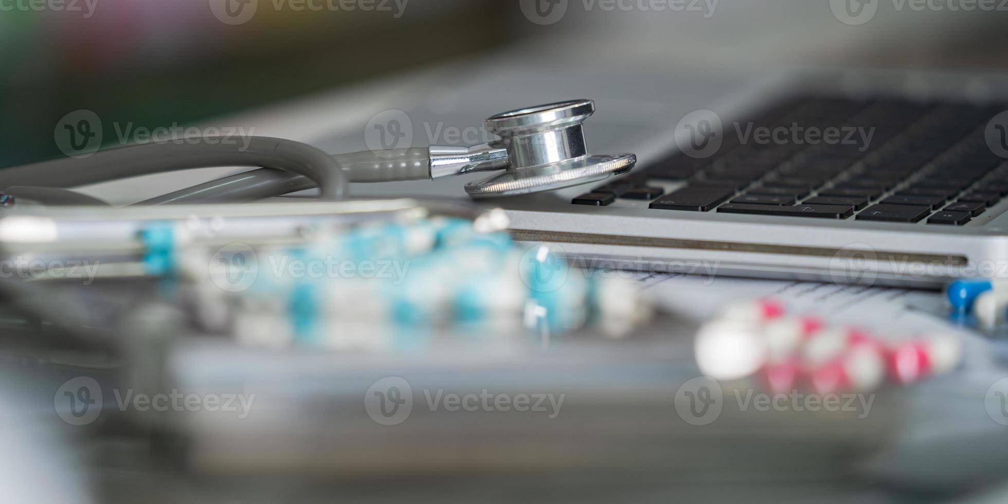Stethoscope and medicine close-up photo