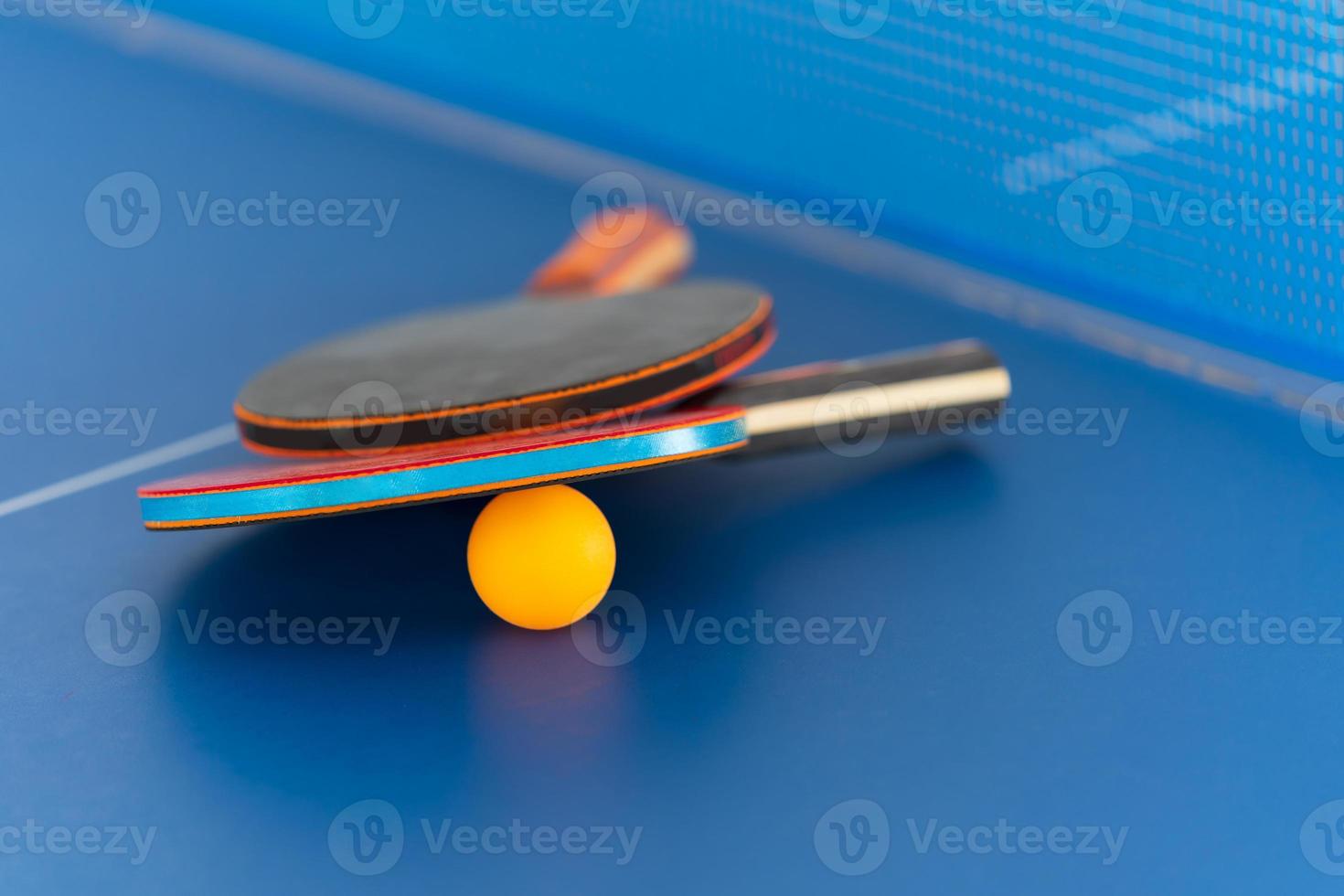 Table tennis racket and ball photo