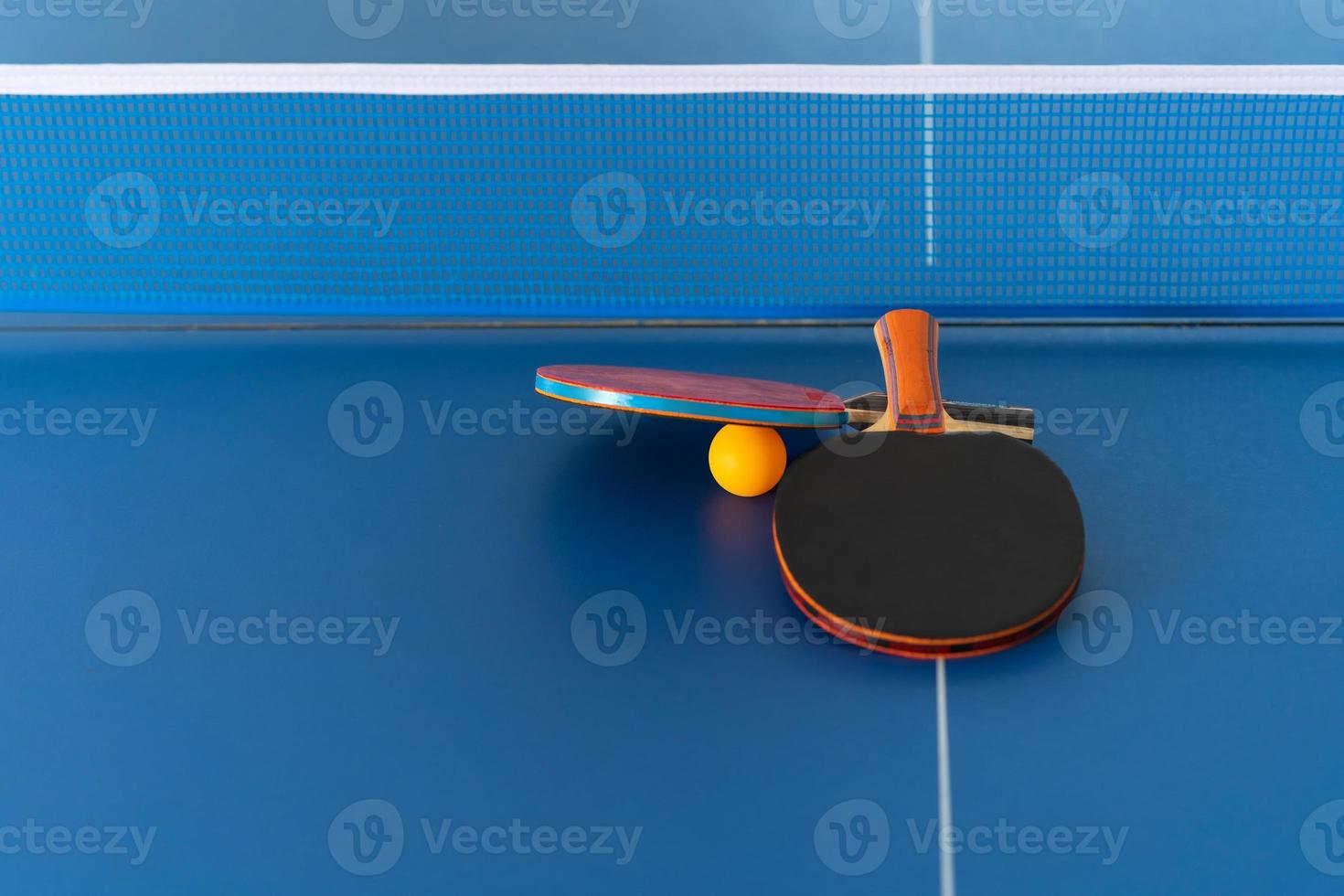 Table tennis racket and ball photo