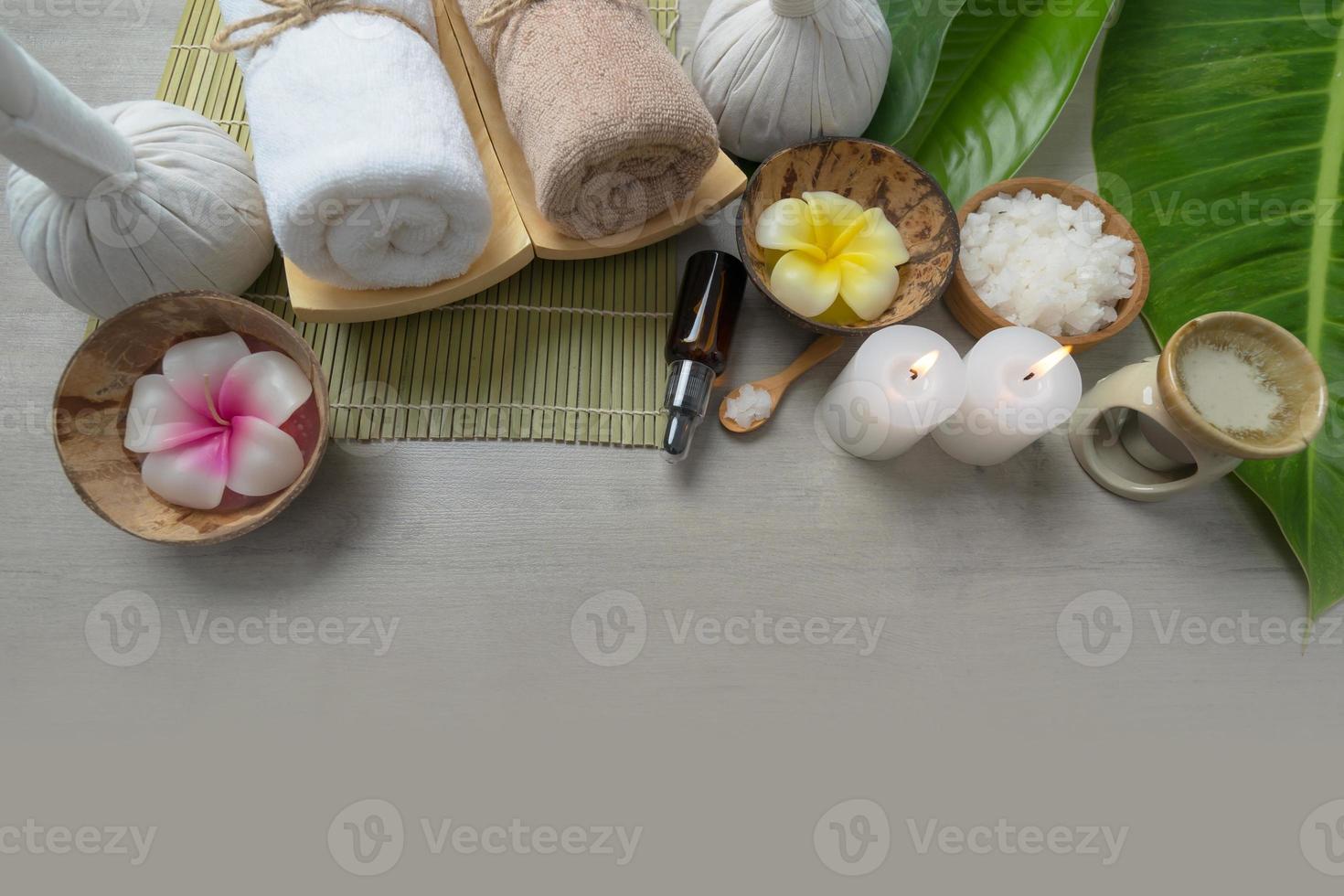 Top view, composition of spa treatment on wooden table photo