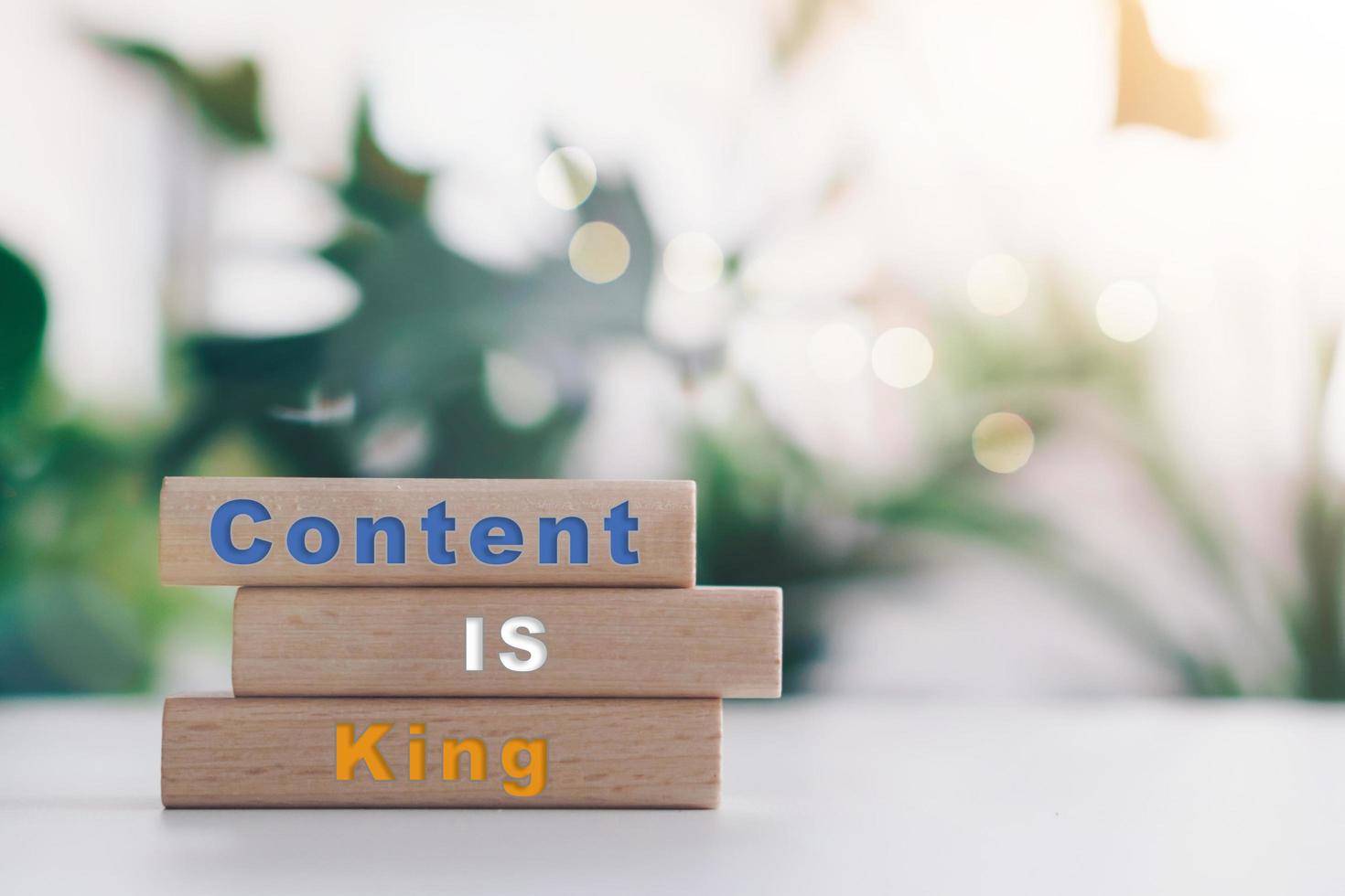 Content is king on wooden board with copy space background photo