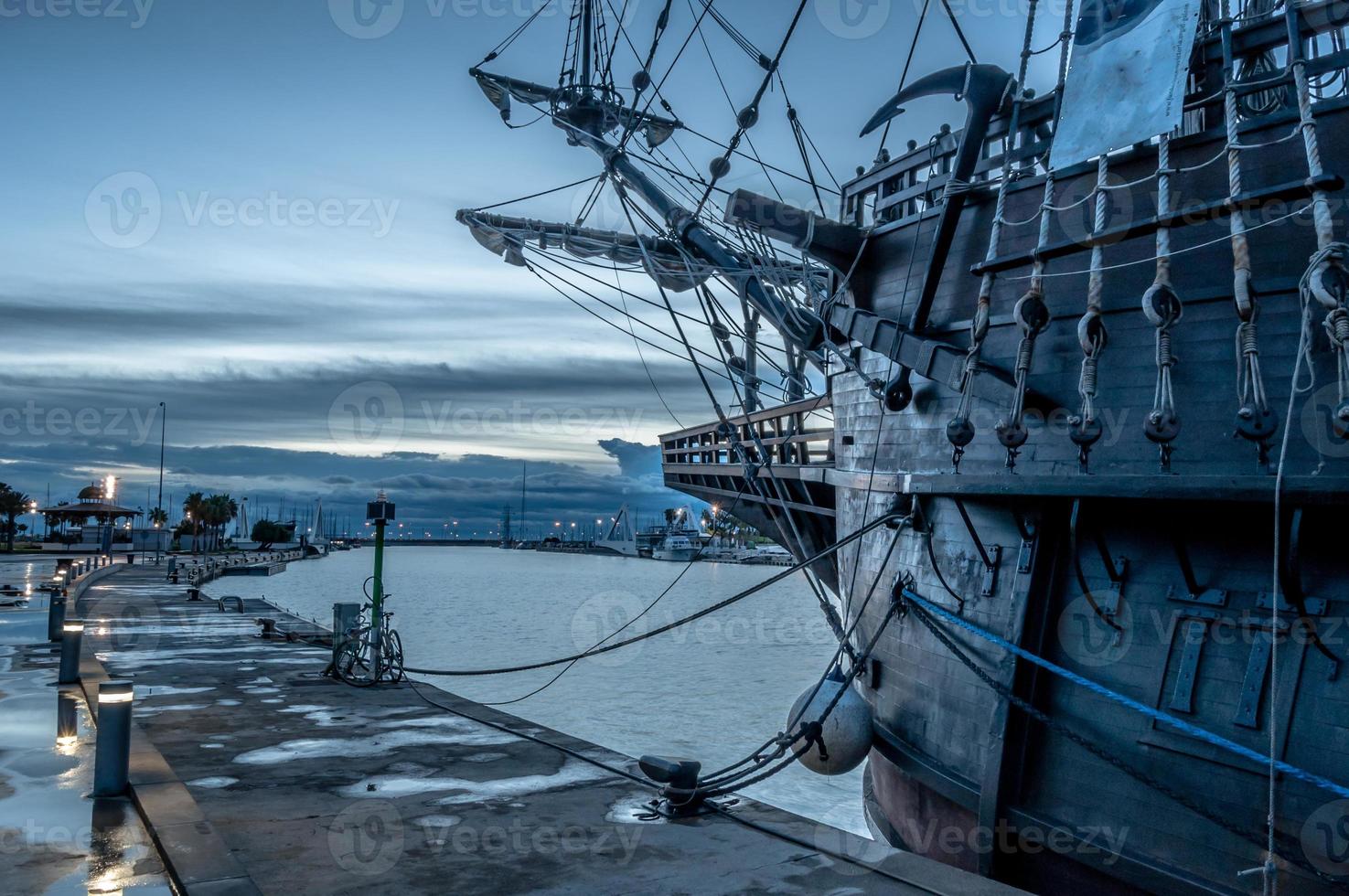 Galleon ship in the port photo