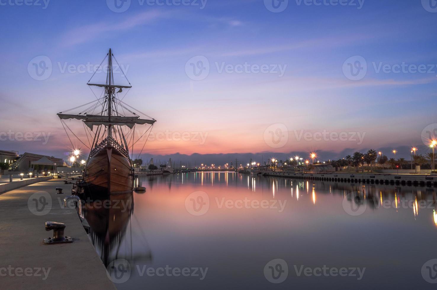 Galleon ship in the port photo