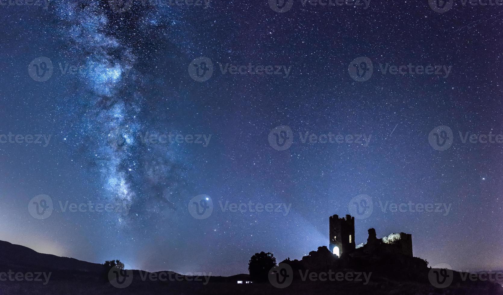 Milky way with a castle photo