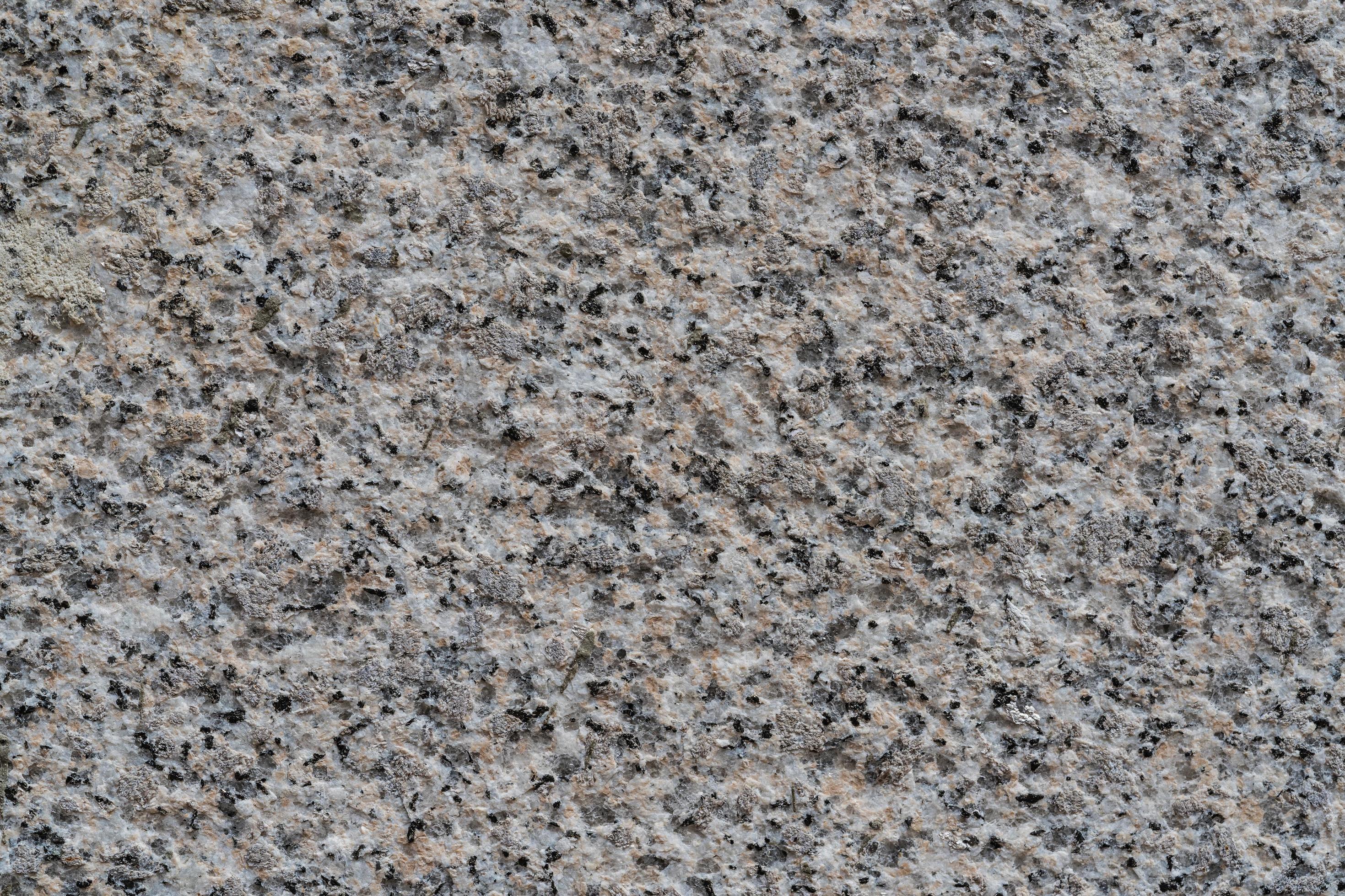 Texture of a granite stone surface photo