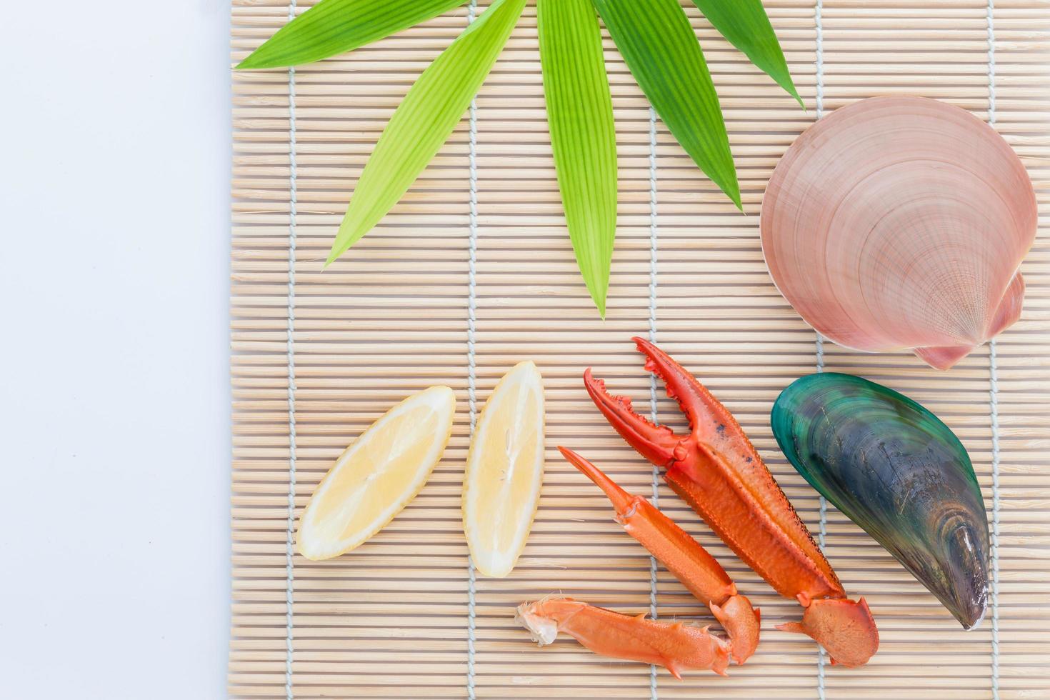 Fresh seafood on a bamboo mat photo