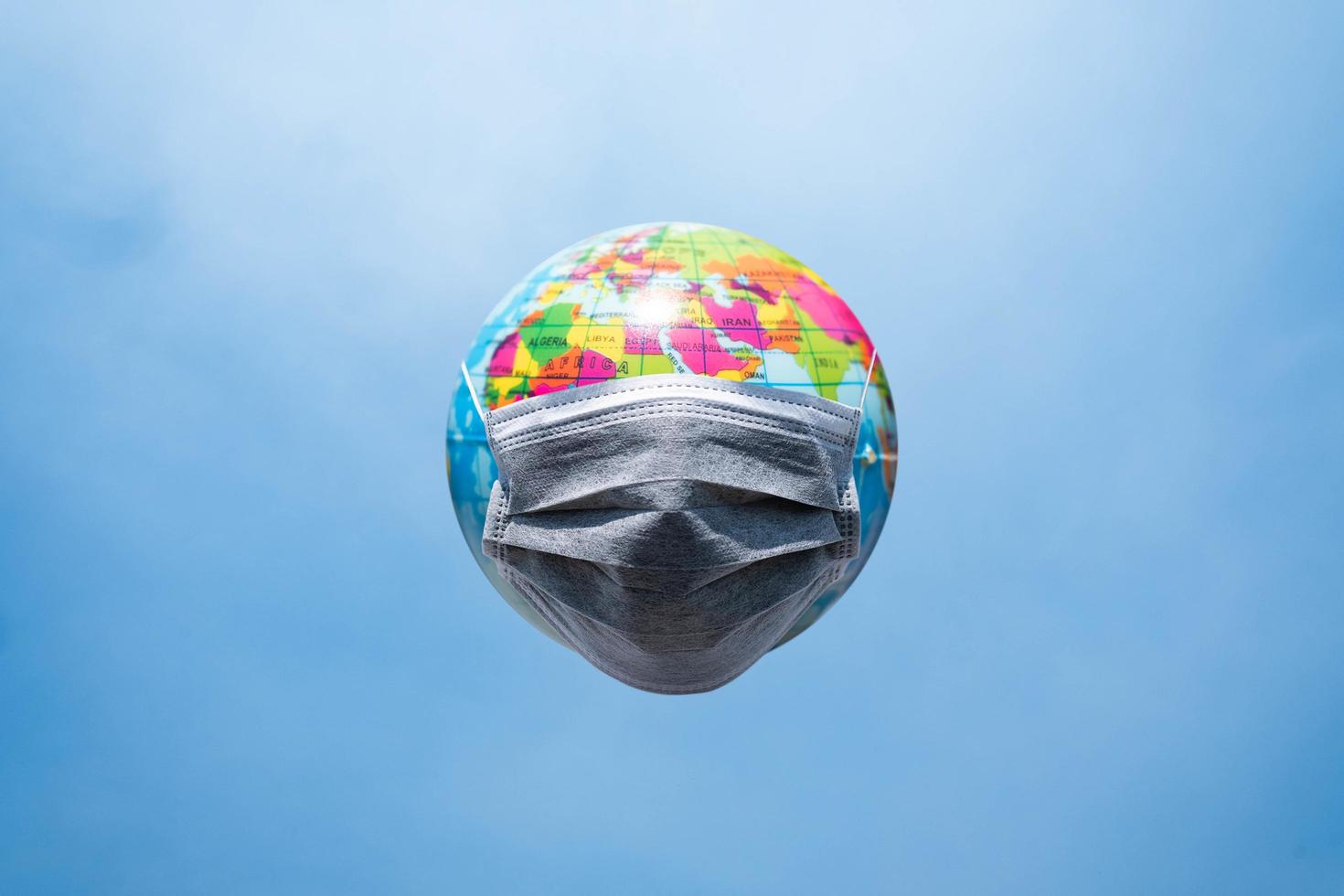 The world defends itself from Covid-19, Earth quarantined by the coronavirus concept photo