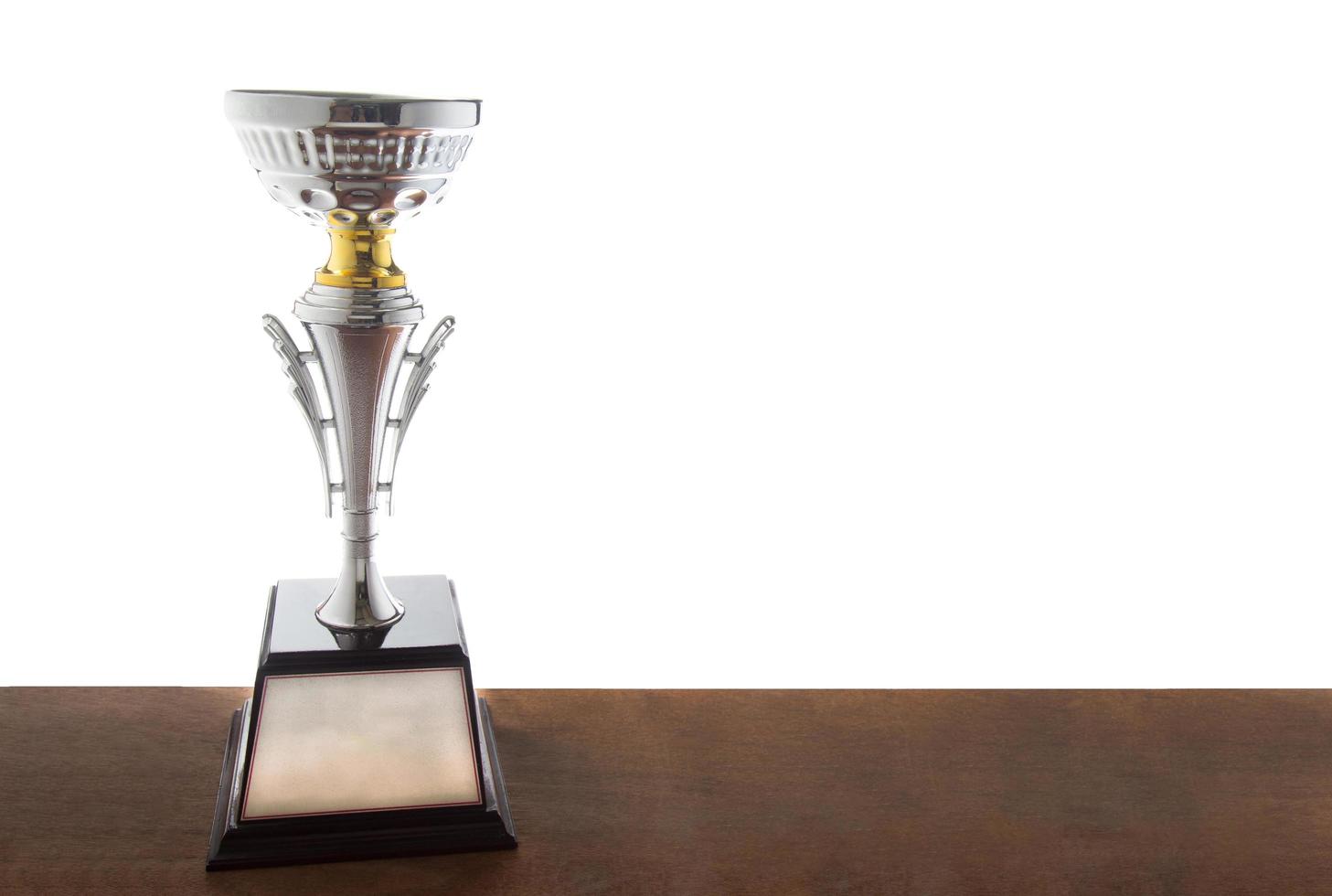 Trophy on a desk on a white background photo