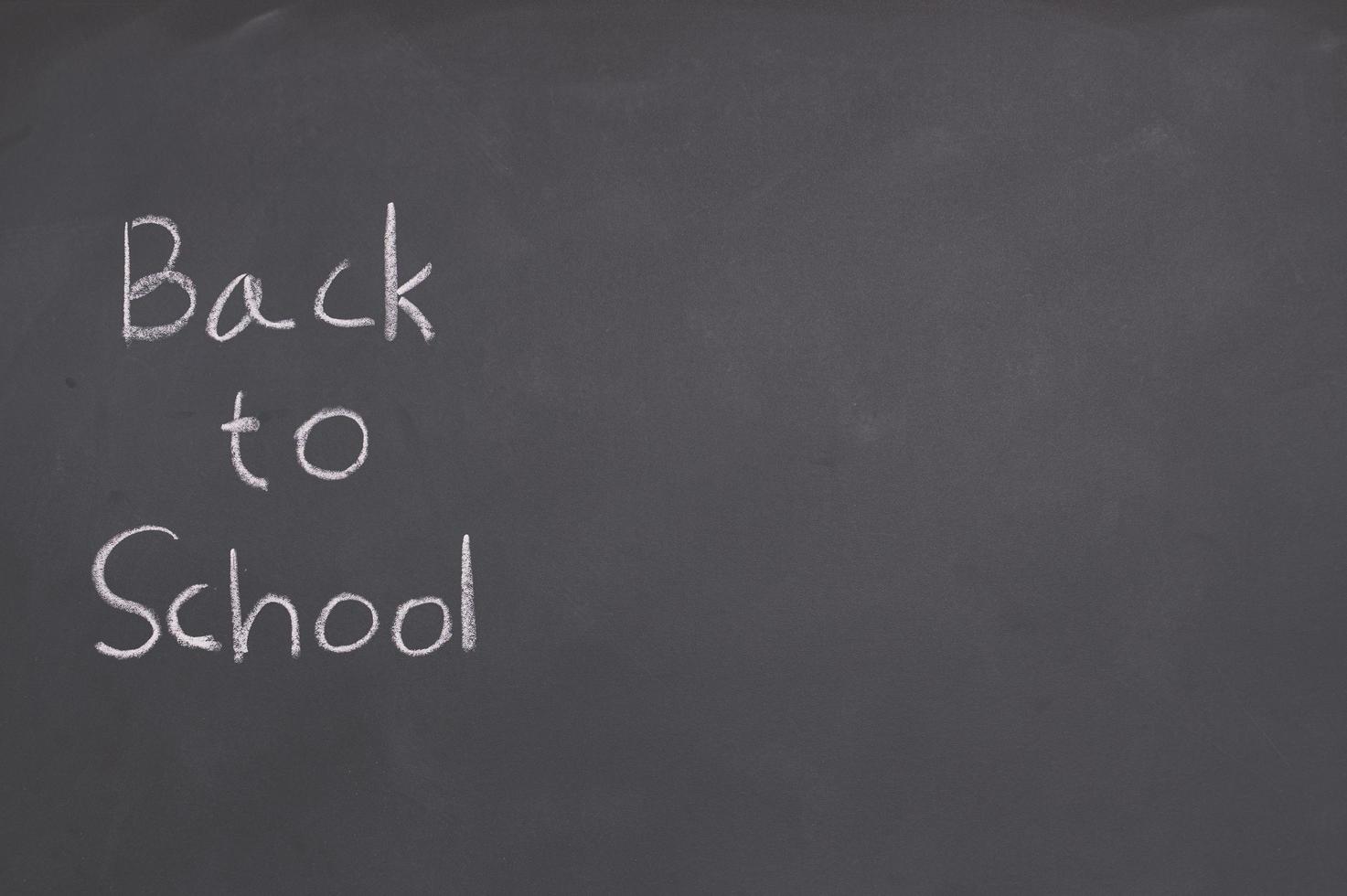 Back to school and education concept on blackboard photo