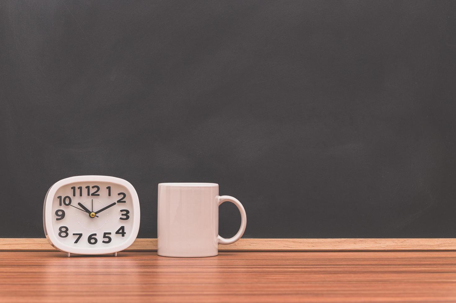 Coffee mugs and clocks photo