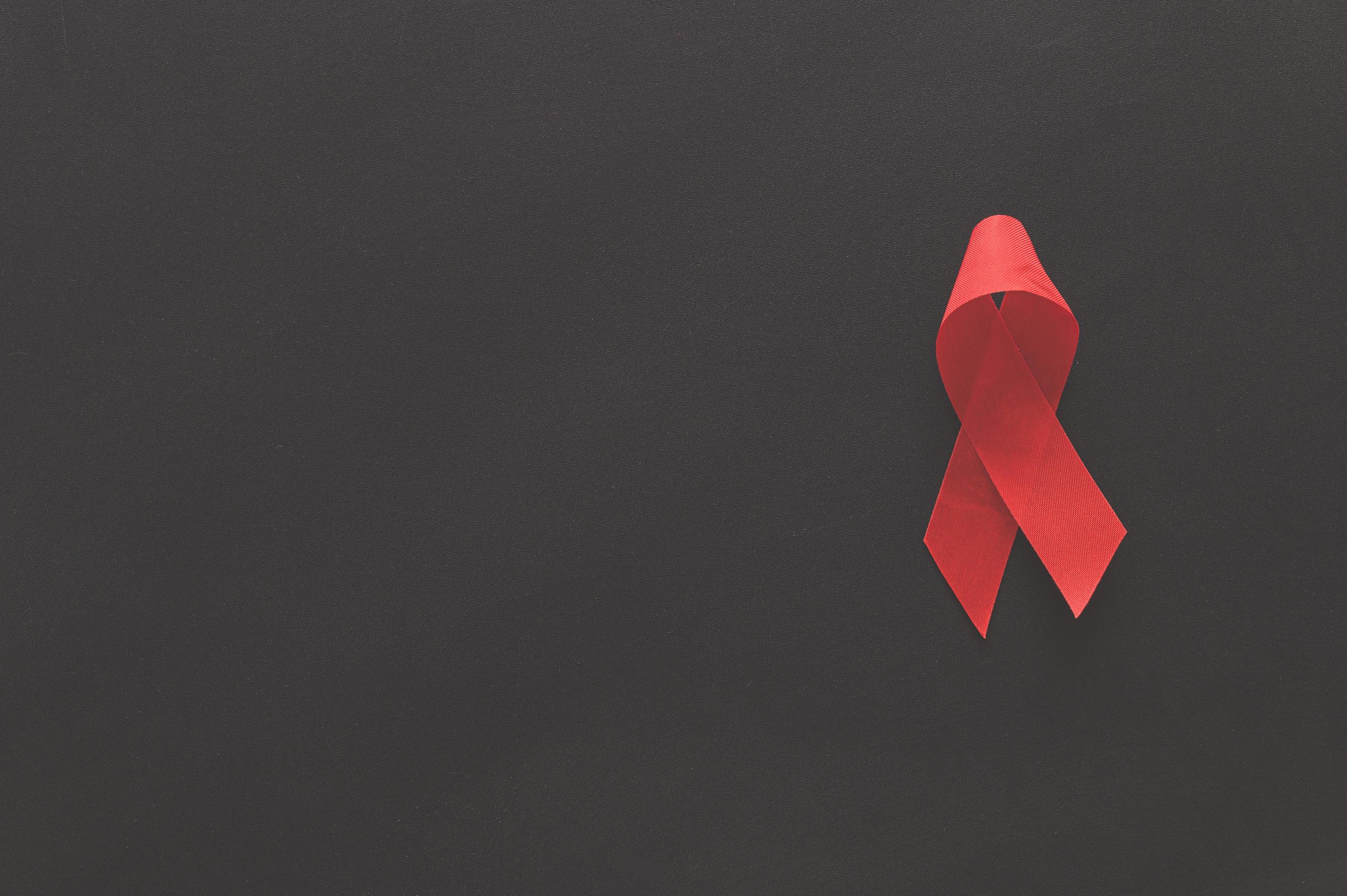 Red ribbon symbolizes World Health Day 2081268 Stock Photo at Vecteezy