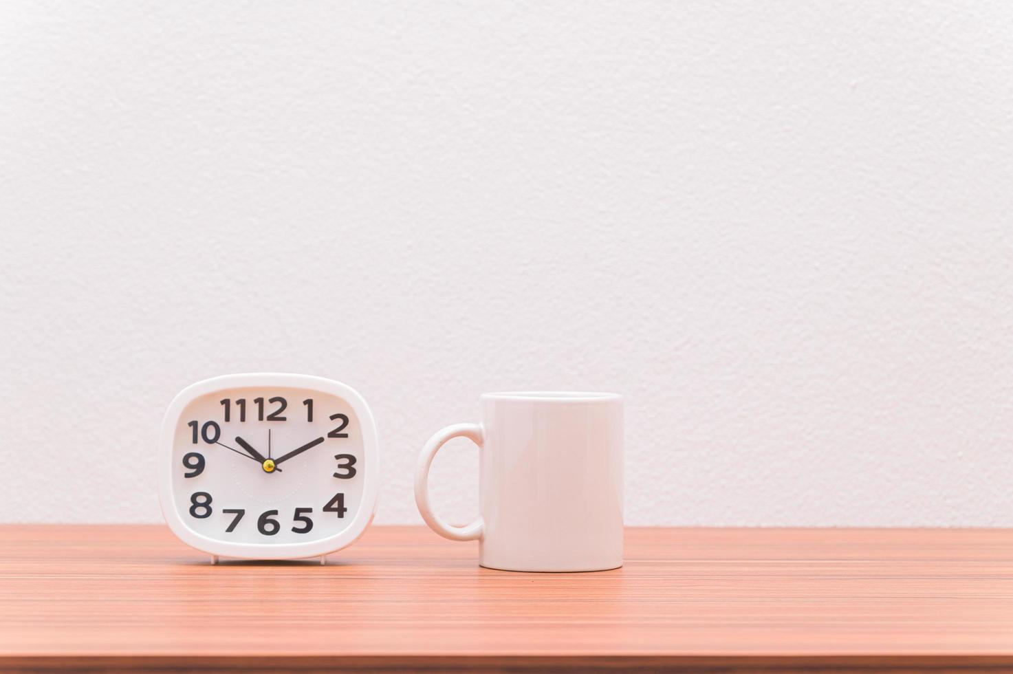 Coffee mugs and clocks photo