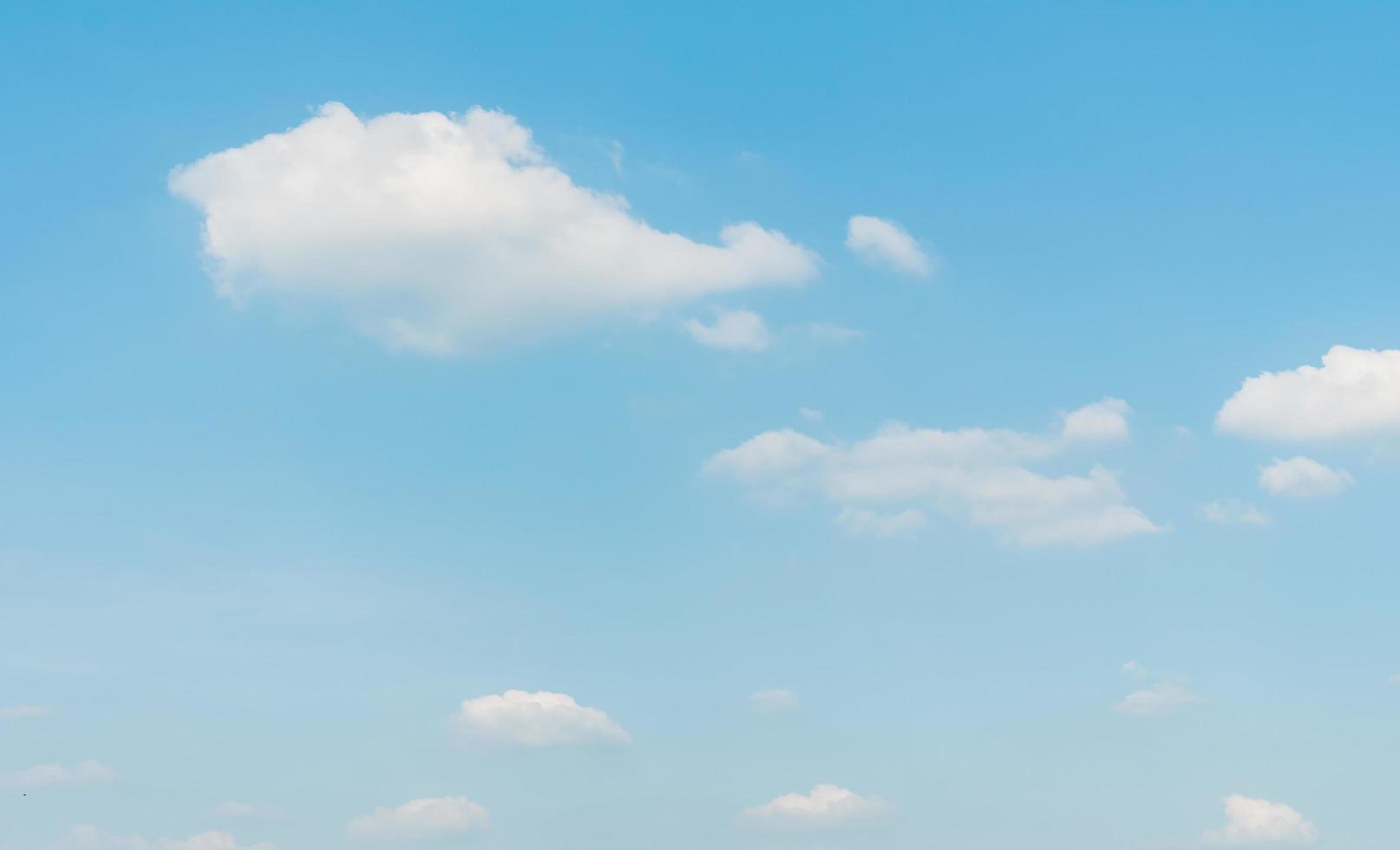 White clouds on blue sky photo