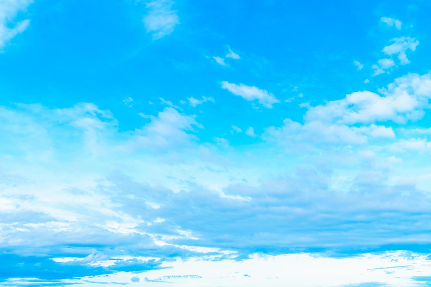 White clouds on blue sky photo