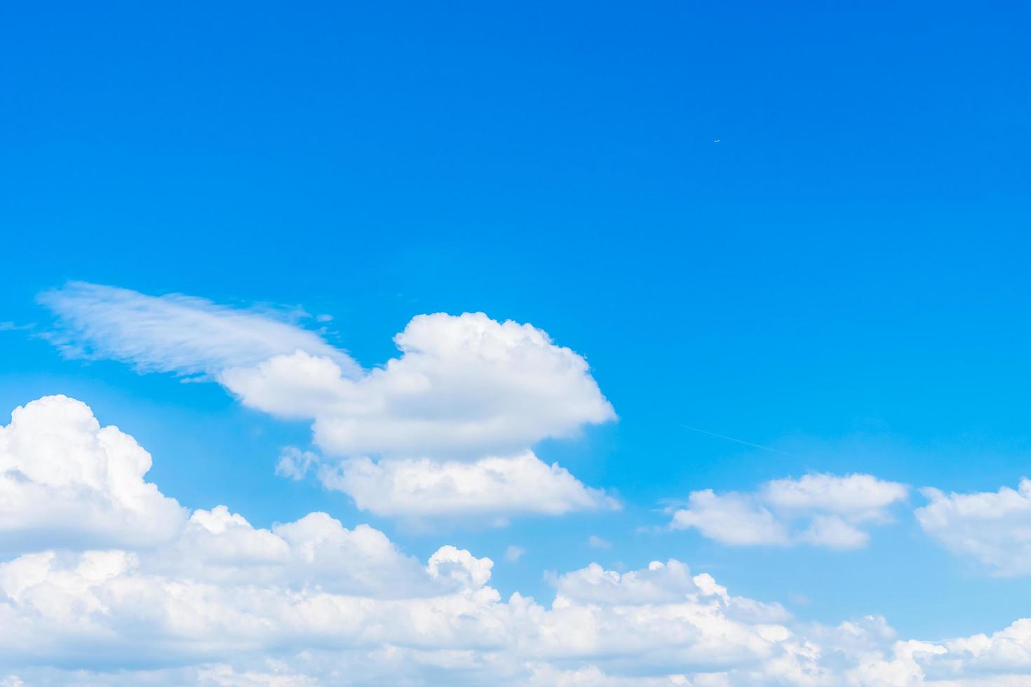 White clouds in the blue sky photo