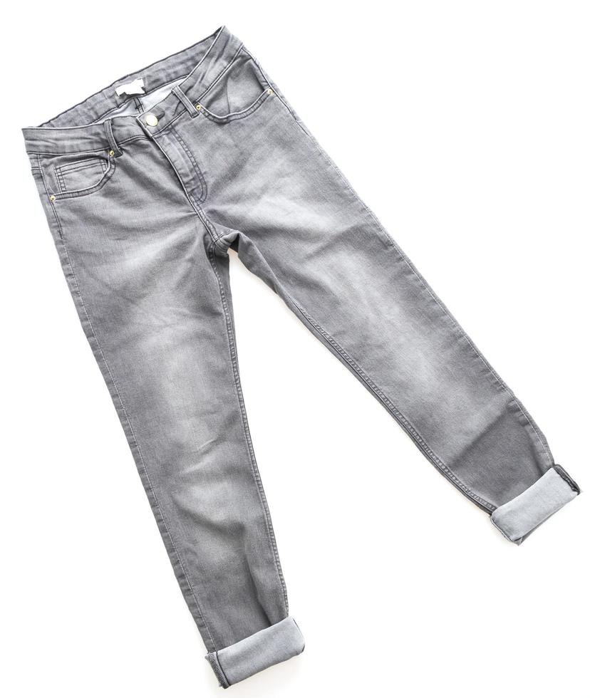 Gray jeans on white background photo