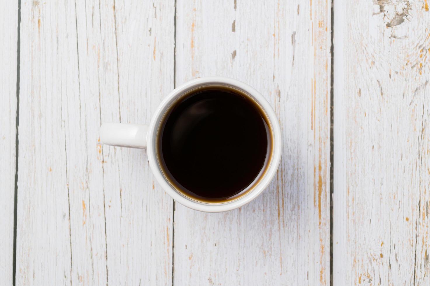 Coffee cup on the table photo