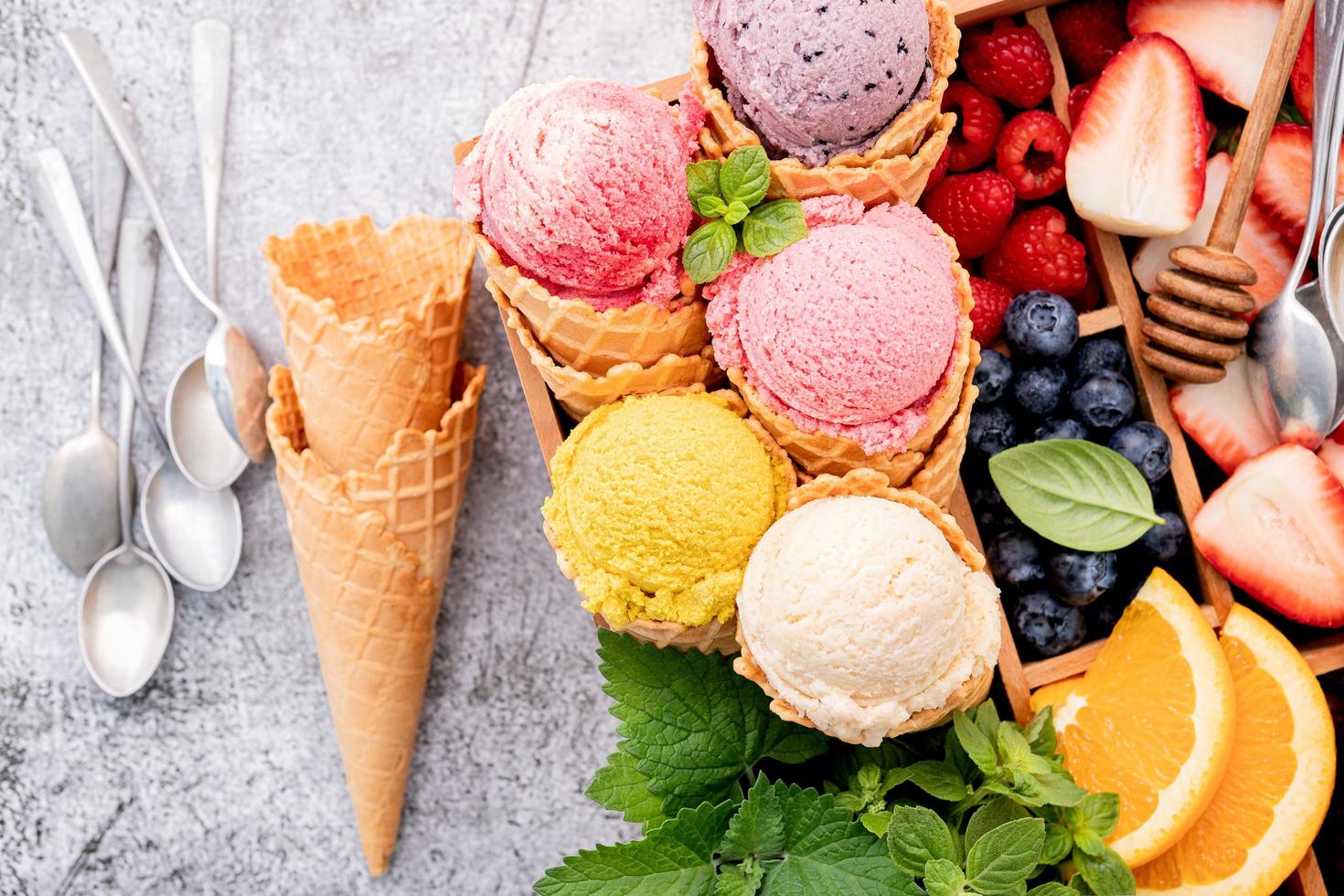 Top view of ice cream and berries in a box photo