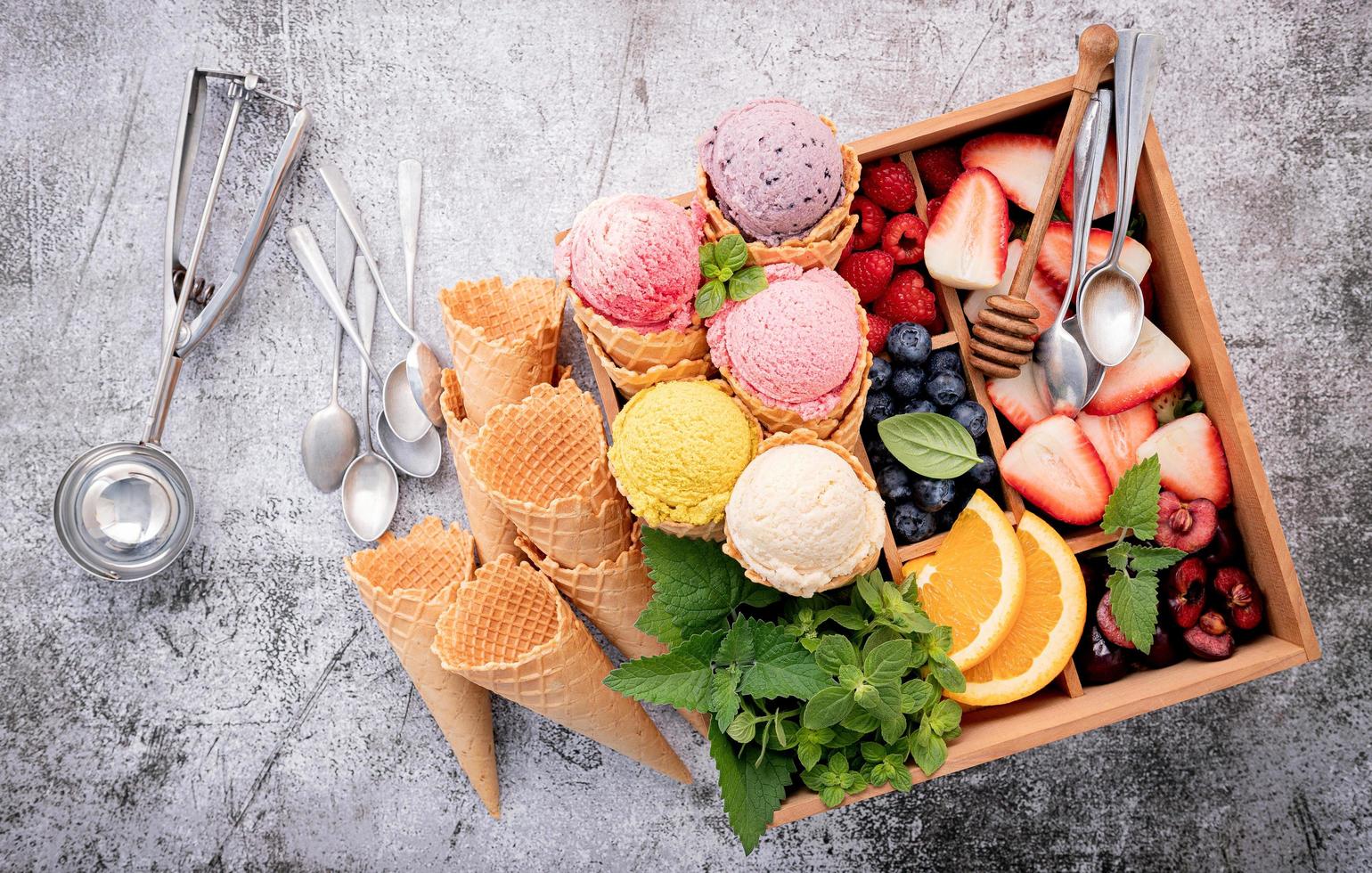 Scoops of ice cream and fruit 2094194 Stock Photo at Vecteezy