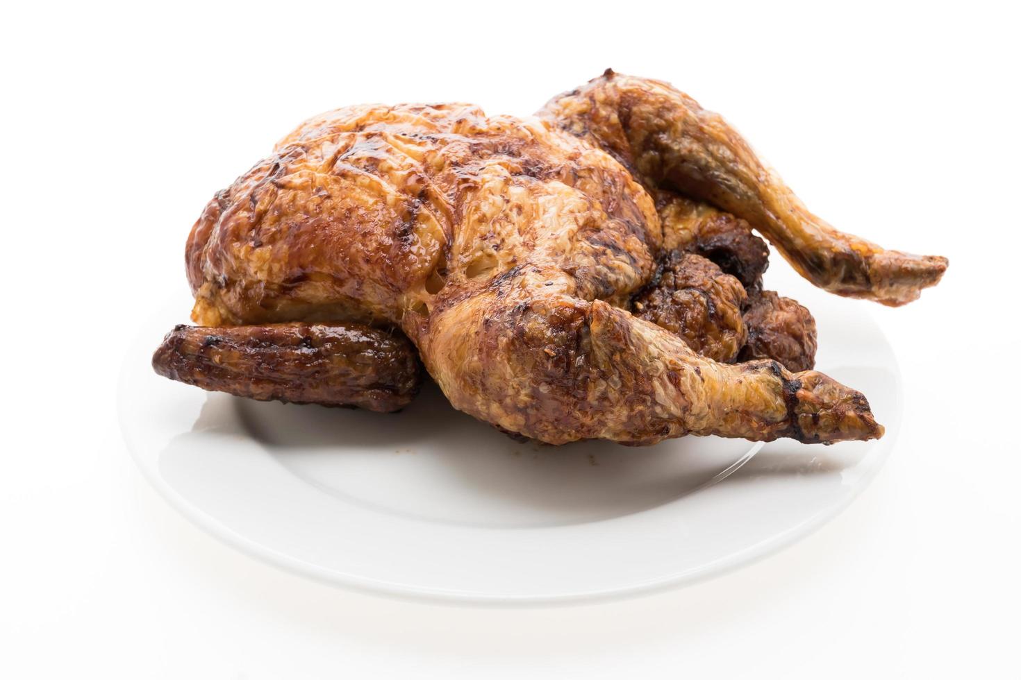 Grilled chicken on white background photo