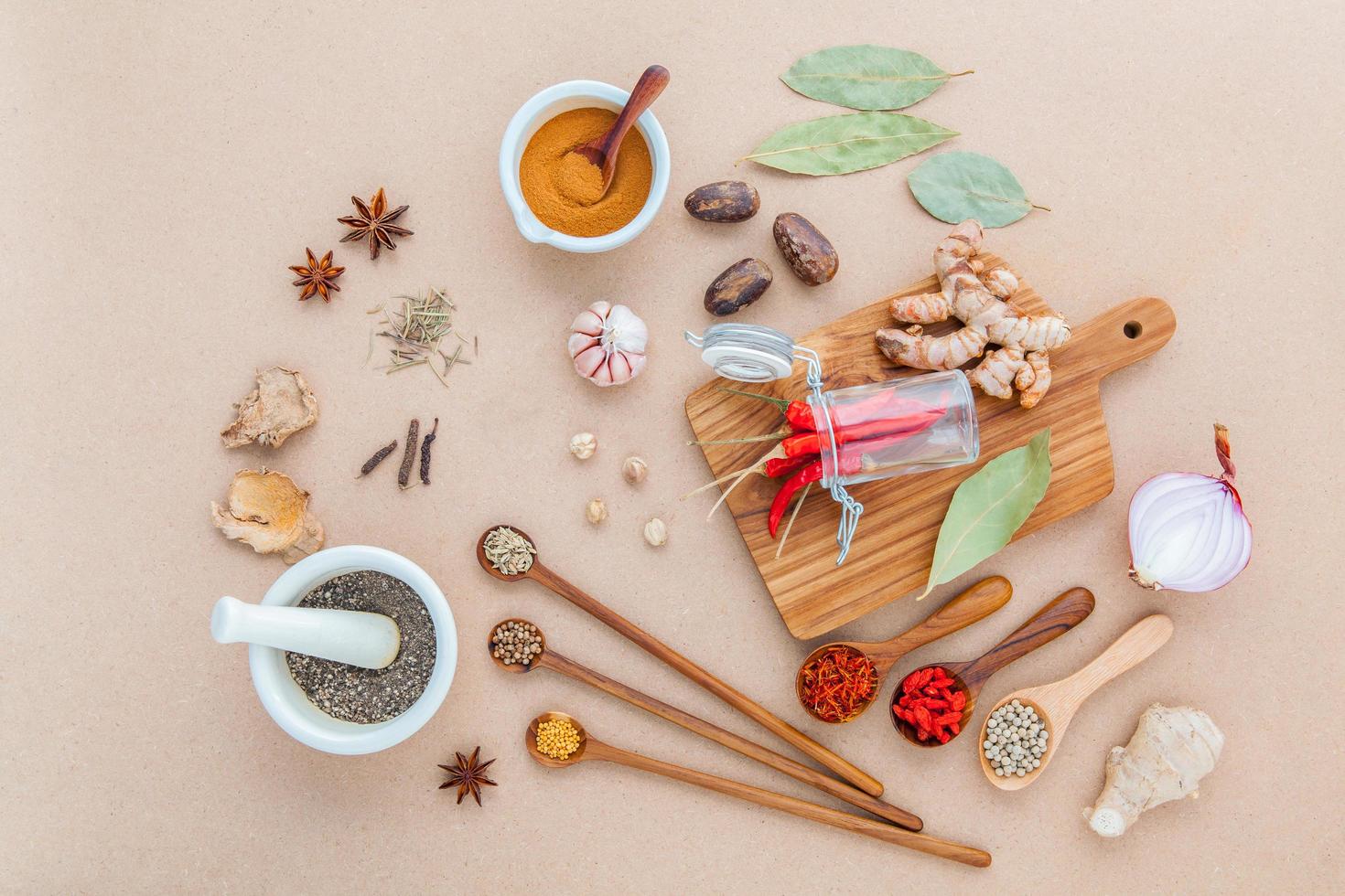 Top view of assorted herbs and spices photo