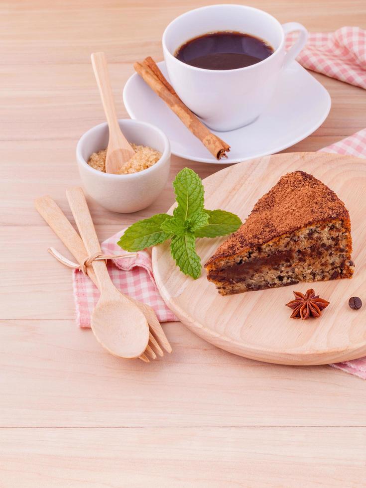 Cake on a wooden plate photo