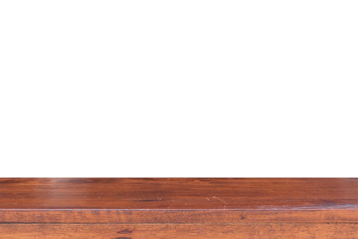 Empty wooden table isolated on a white background photo
