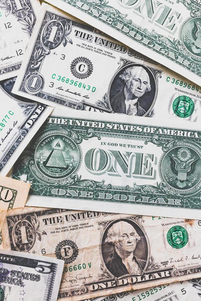 American dollars or US dollar banknotes background photo