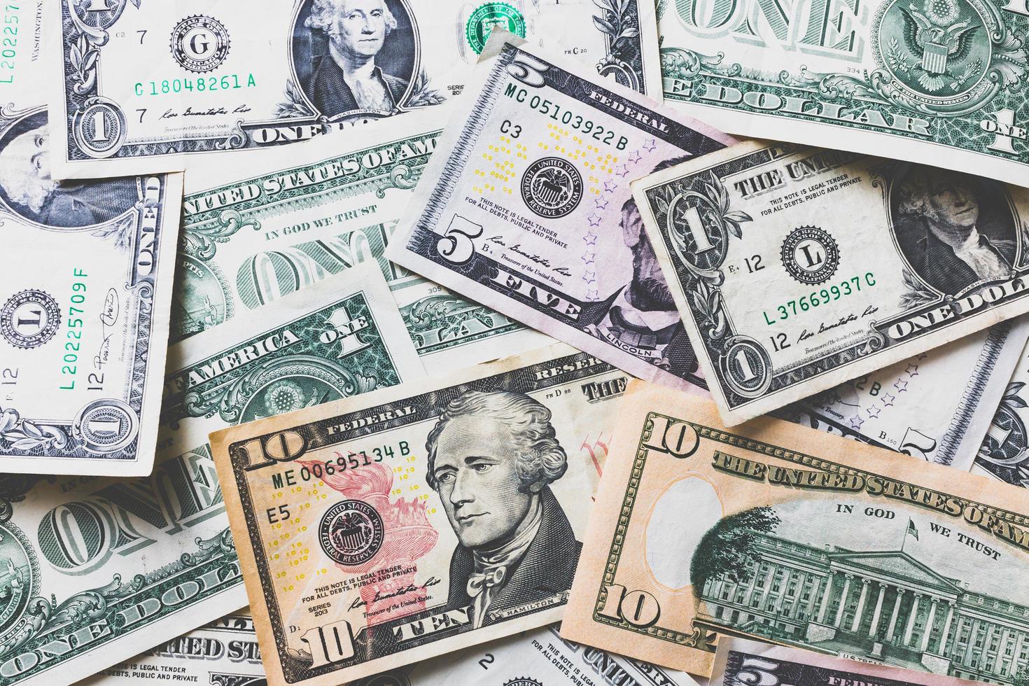 American dollars or US dollar banknotes background photo