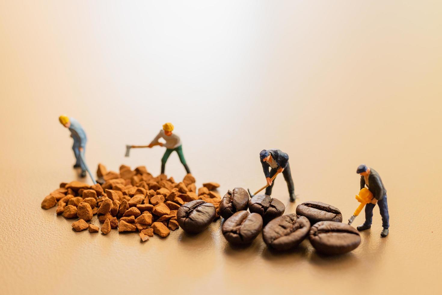 Miniature teams working together on coffee blending photo