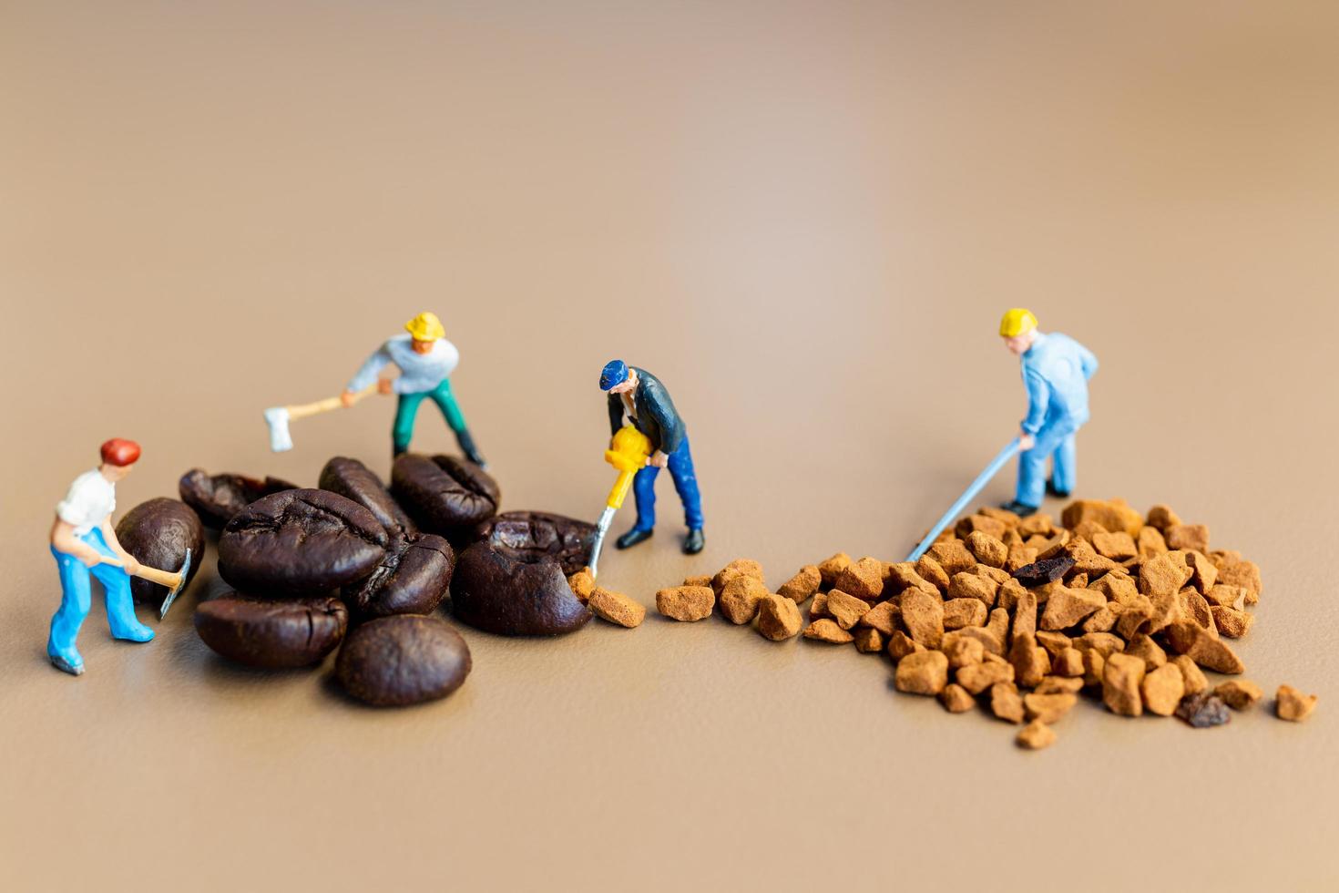 Miniature teams working together on coffee blending photo