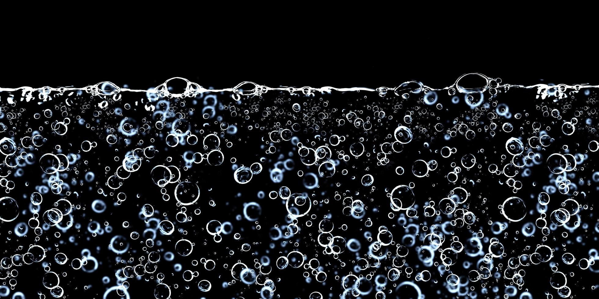 3D illustration of underwater bubbles on a black background photo