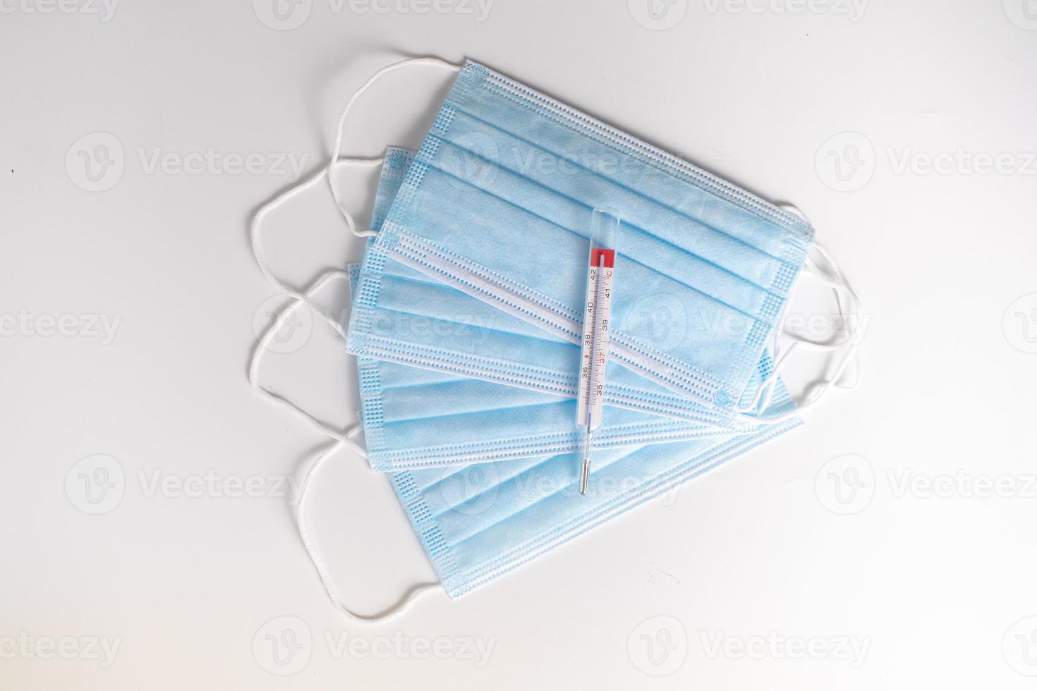 Surgical masks with thermometer photo