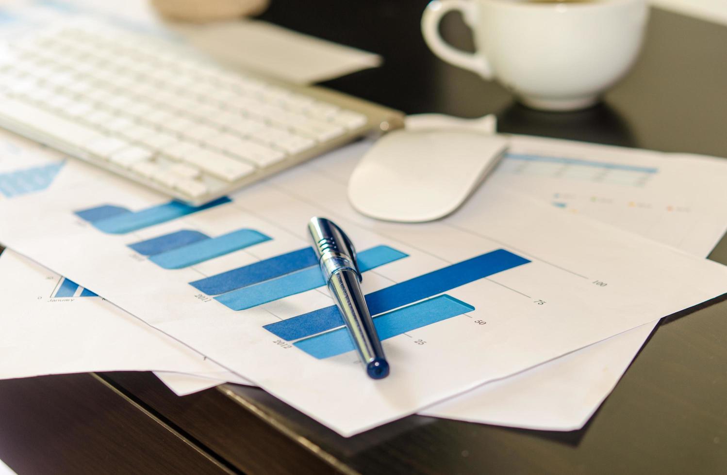 Pen on business documents photo