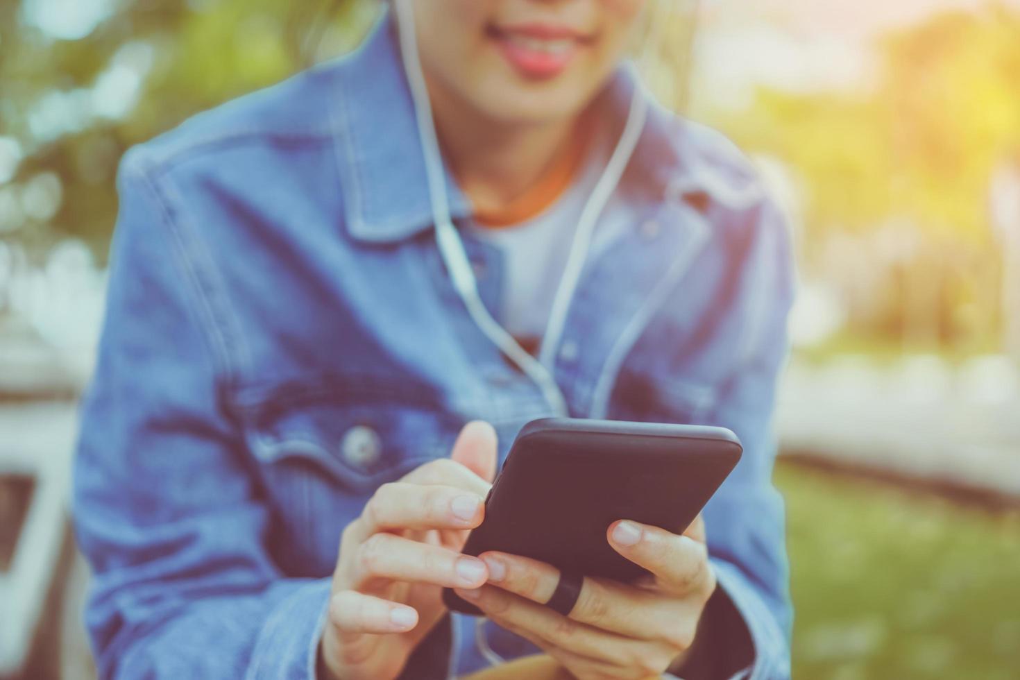 Woman using smartphone photo