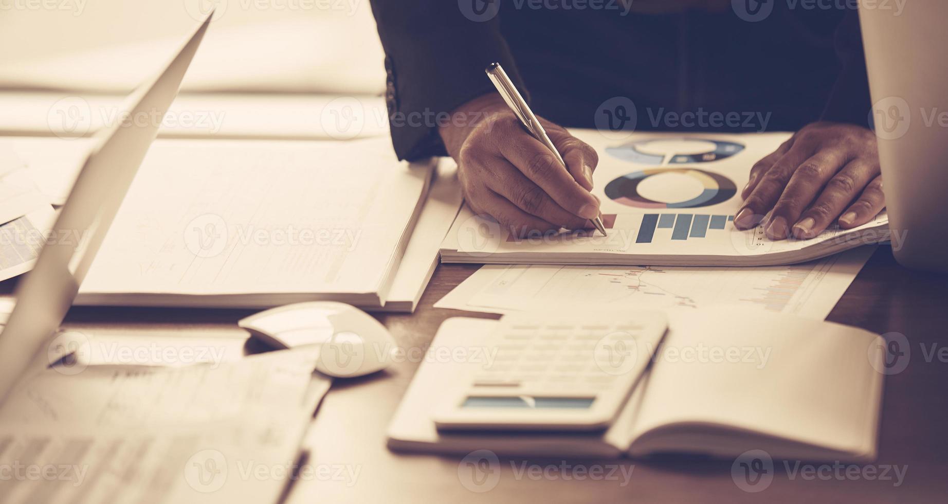 Businessman approving a project in office photo