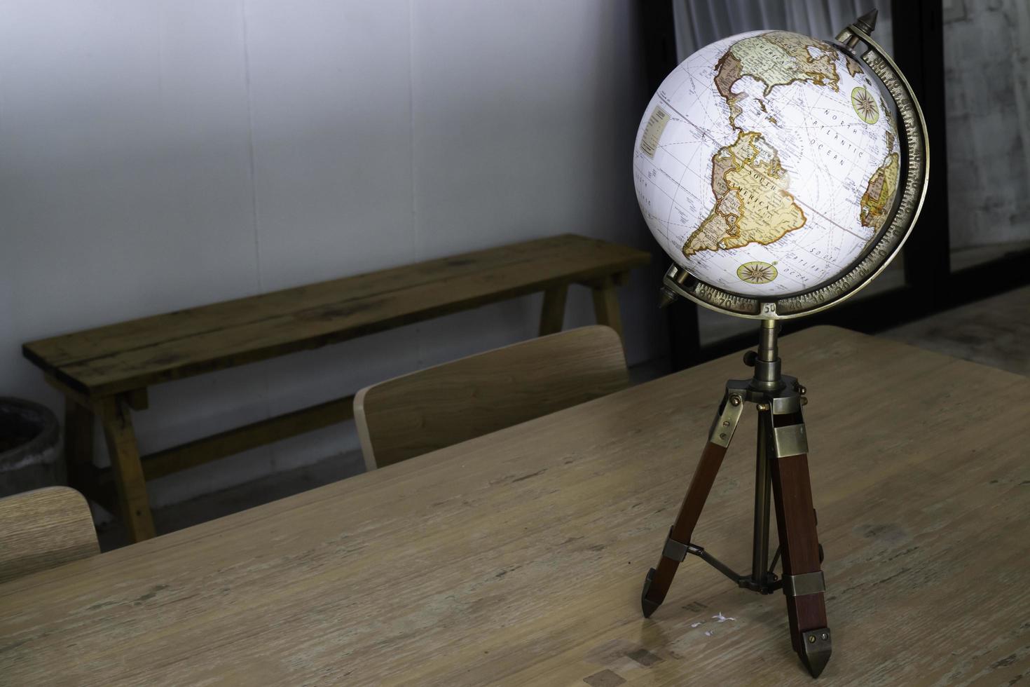 Vintage globe on top of the table photo