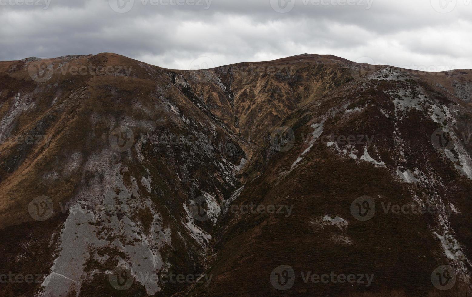 Mountains stripped of their vegetation after a fire photo