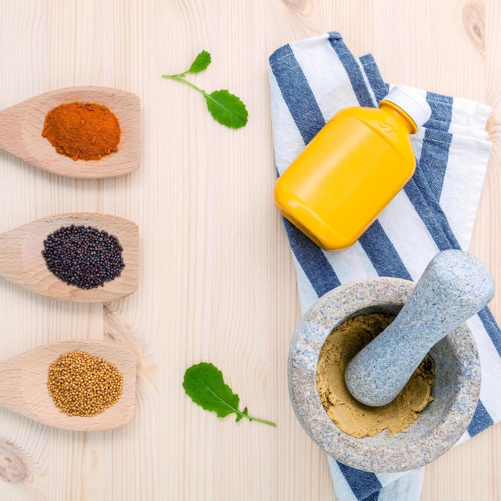 Ground spices and seeds with mustard photo