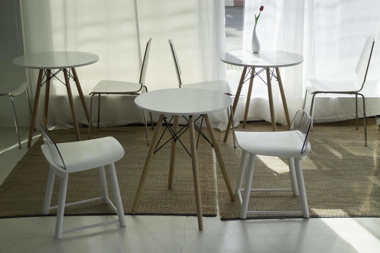 Tables and chairs in a cafe photo