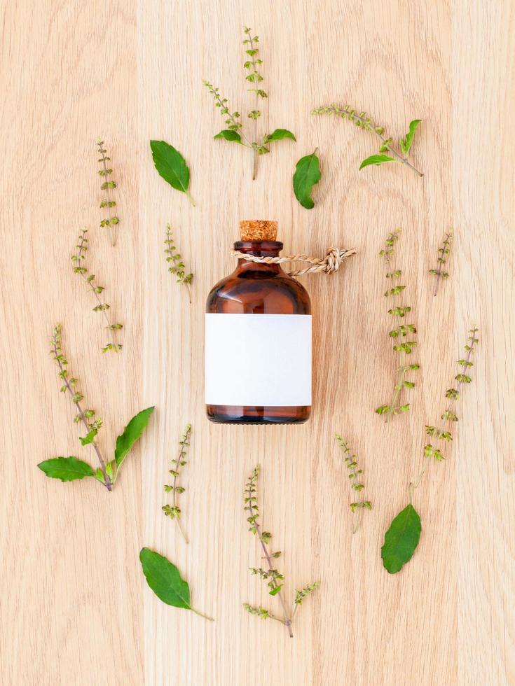 Basil essential oil flat lay photo