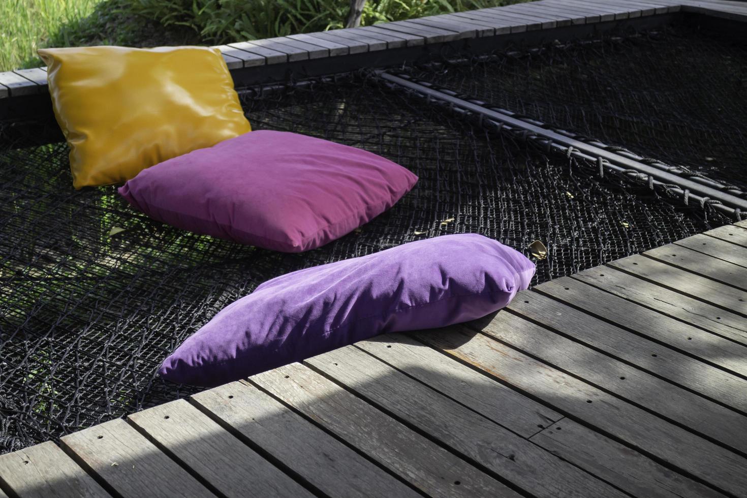 Colorful pillows on a hammock photo